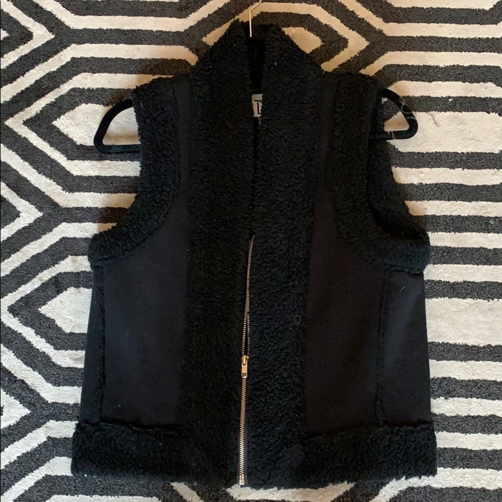 Black zip up vest
